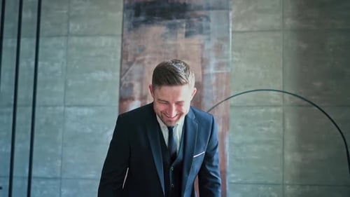 Handsome Man in Suit Smiling and Laughing
