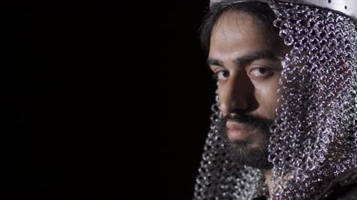 Medieval Knight Close-Up with Helmet and Chainmail