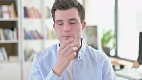Young Adult Deep in Thoughtful Contemplation