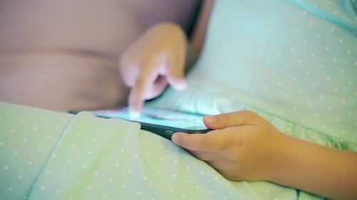 Girl Child Preschooler Uses Smartphone