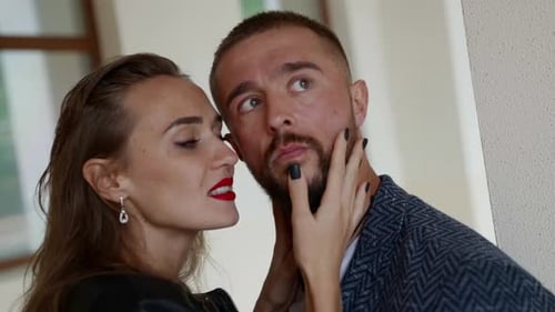 Intimate Couple Touching Faces in an Urban Setting