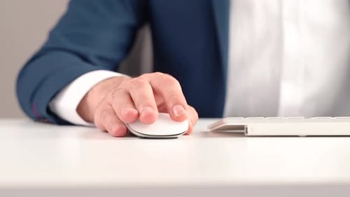 Close Up of Hand Using a Computer Mouse