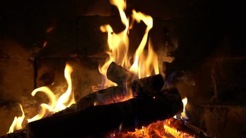 Warm Flames Flickering in Brick Fireplace