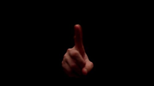 Finger Interacting with a Touchscreen, Dark Background