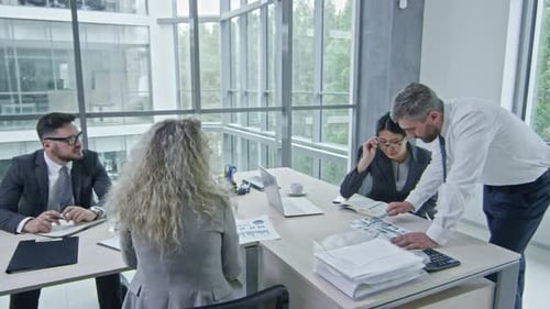 Business Team Meeting in Modern Office Space