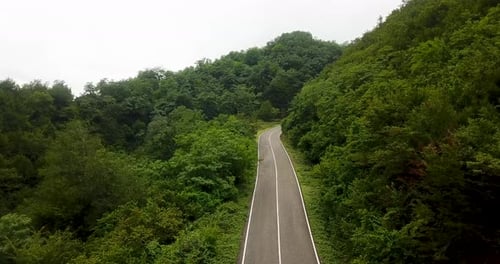 Empty Road Without Trip Car Endless 2 Way Asphalt Straight Curved Highway Freeway In Daytime at Sunr