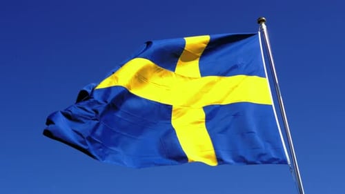 Sweden Flag Waving Against Blue Sky