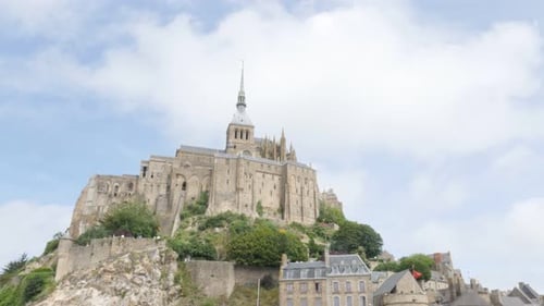 France Normandy fortified Mont Saint Michel by the day 4K 3840X2160 UHD slow tilt video - Abbey Mt