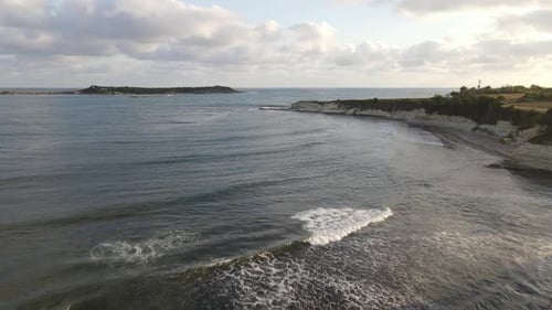 Aerial View of Beach with Gentle Waves