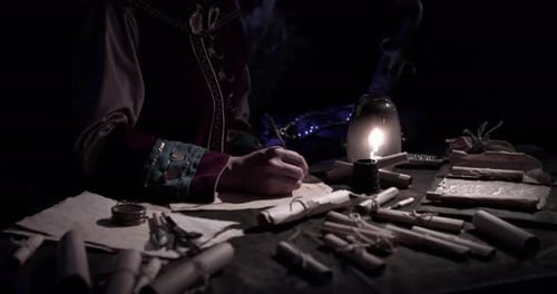 Writing a Scroll by Candlelight in the Dark