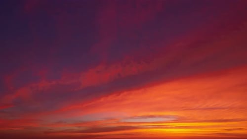Time lapse of Sunset sky. Abstract nature background. Dramatic blue with orange