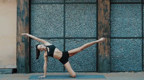 Young beautiful woman practicing yoga. Wellness concept. Calmness and relax, woman happiness. Toned