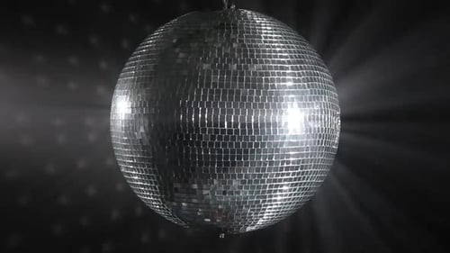 Rotating Disco Ball Creates Dazzling Light Display