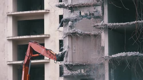 Building Demolition Using Heavy Construction Machinery