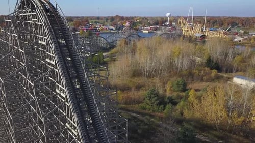 Colorful aerial shot of rides at closed amusement park in Michigan