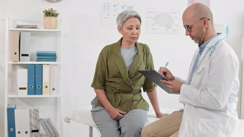 Doctor Seeing Patient in Office