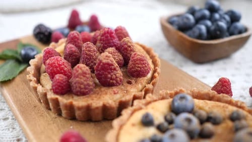 Delicious Raspberry and Blueberry Tarts Close Up