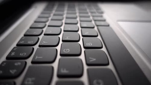 Laptop Computer Keyboard Close Up Panning Shot