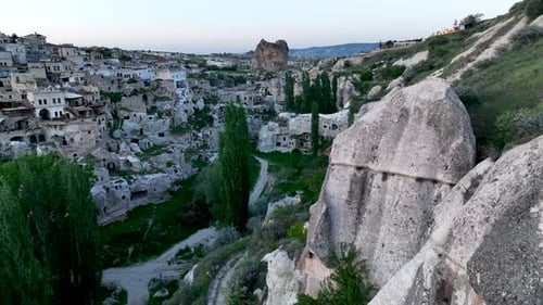 Cappadocia, a semi-arid region in central Turkey, is known for its distinctive fairy chimneys tall,