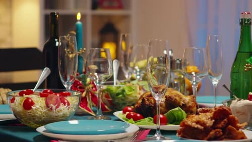 Festive Table Set with Christmas Food and Wine