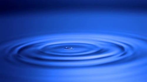 Abstract Water Droplet Impacting Blue Surface