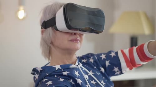 Woman Using Virtual Reality Headset Indoors