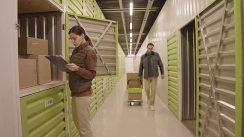 People Working in Warehouse