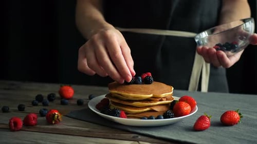 Pancakes Topped With Colorful Fresh Berries