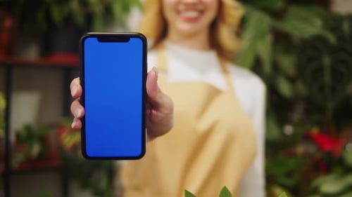 Florist Woman Holding Smartphone with Chroma Key