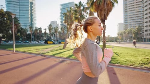 Slim Millennial Woman Jogger Practice Morning Run By Urban Area