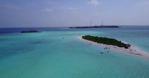 Daytime overhead copy space shot of a sunshine white sandy paradise beach and turquoise sea