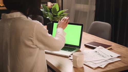 Caucasian Businesswoman Working on Laptop Green Screen Chromakey at Home Office