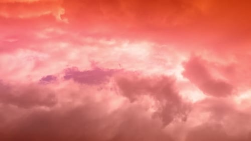 Colorful Clouds Drifting Across the Sky at Sunset