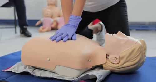 Performing CPR on a Medical Training Mannequin