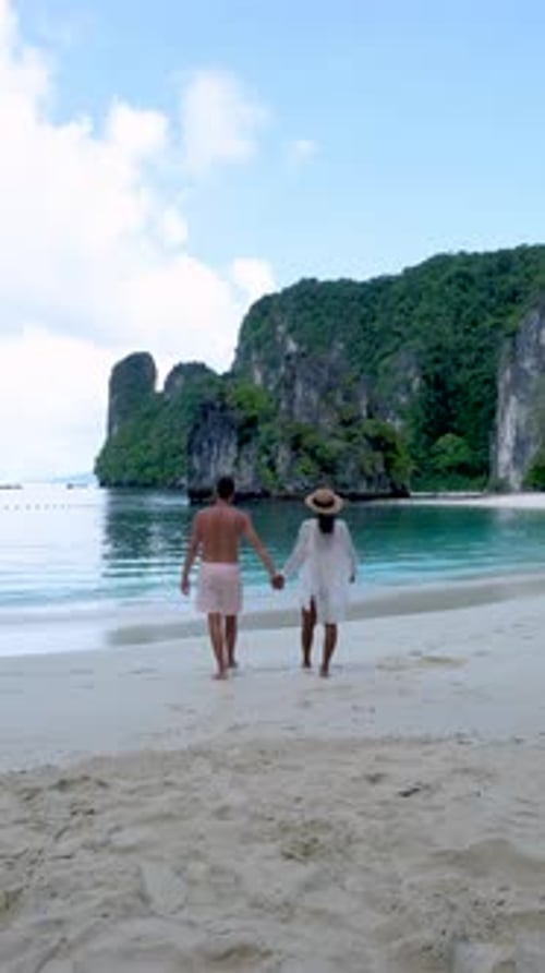 Koh Hong Island Krabi Thailand Couple Men and Woman on a Tropical Beach in Thailand