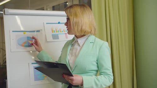 Professional Woman Giving Business Presentation