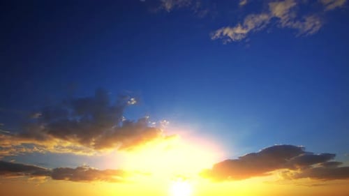 Brilliant Sunrise Illuminates Cloudscape Time Lapse