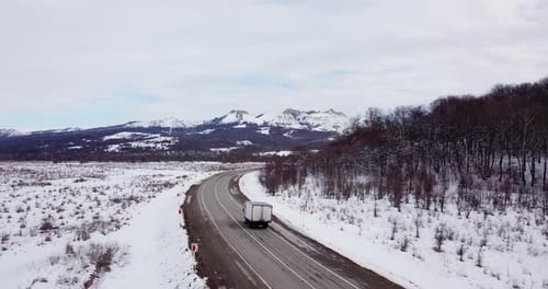 Aerial View Deep Winter Rural Country Landscape Flying Over Along Deserted Road