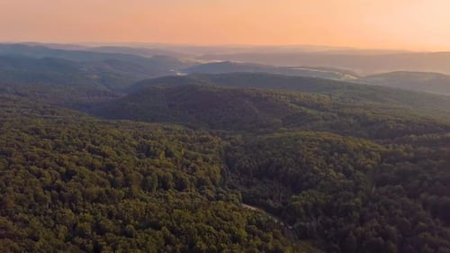 Aerial Evening Colors over Forest Mountains