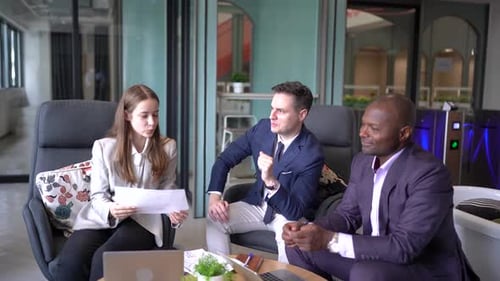 Business Professionals Meeting in Modern Office Space