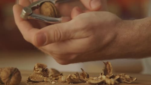 Man cutting walnut