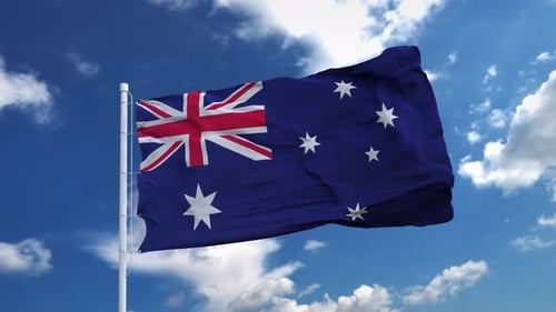 Australian Flag Waves in the Blue Sky