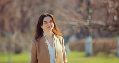 Modern Girl Walks Around the City in Spring a Young Woman Rejoices at Life