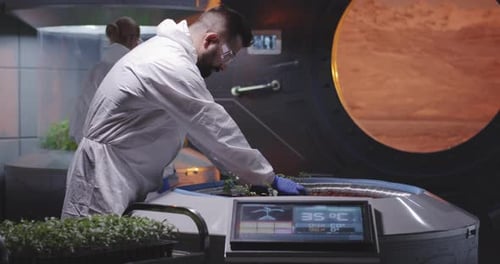 Astrobiologists Planting Seedlings on a Mars Base