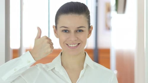 Woman Giving Thumbs Up of Approval