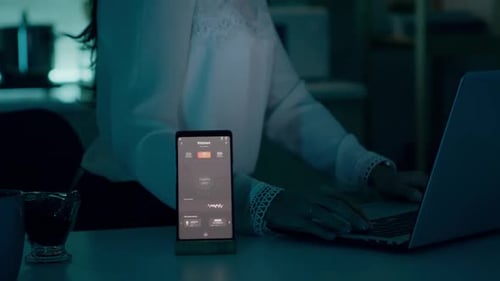 Woman Controls Smart Home Using App on Phone