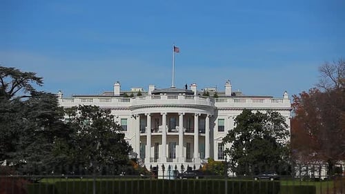Static shot of the White House in Washington DC from across the street
