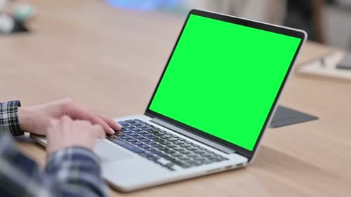 Female Hands Using Laptop with Green Chroma Key Screen