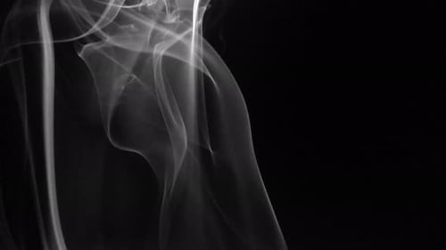 Abstract Swirling Smoke Texture on Black Background