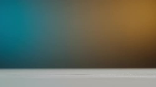 Gloved Hand Wiping Clean White Surface